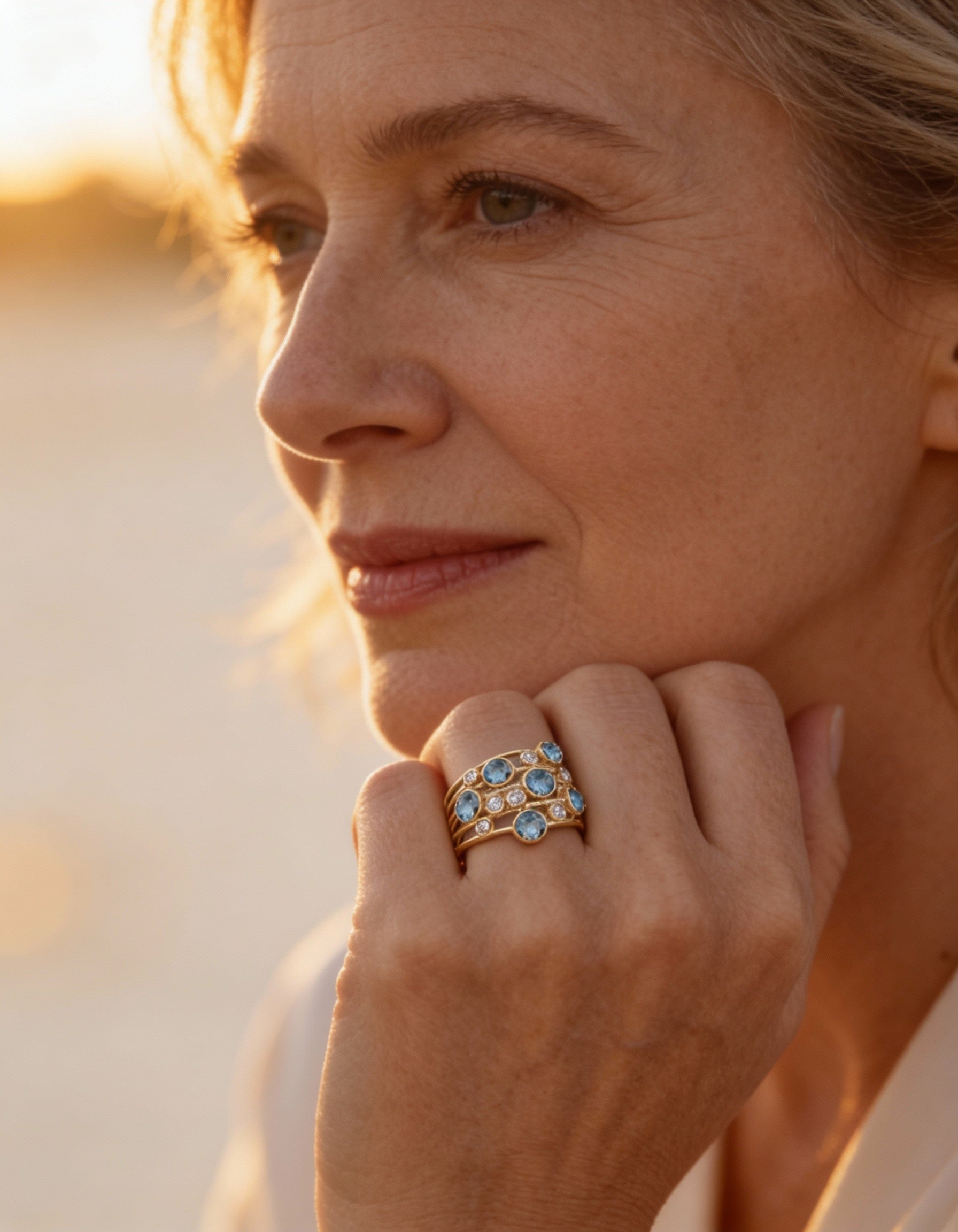 Vintage Gold Multiple Blue and White Cubic Zirconia Ring