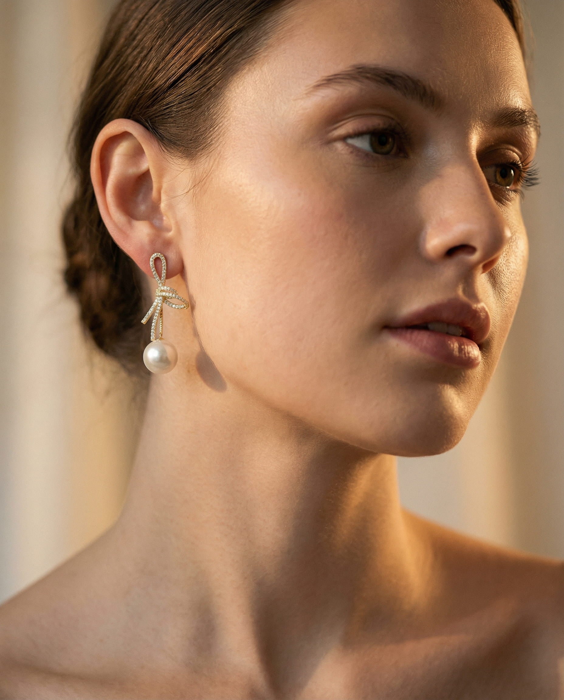 Gold Sparkling Bow Pearl Earrings