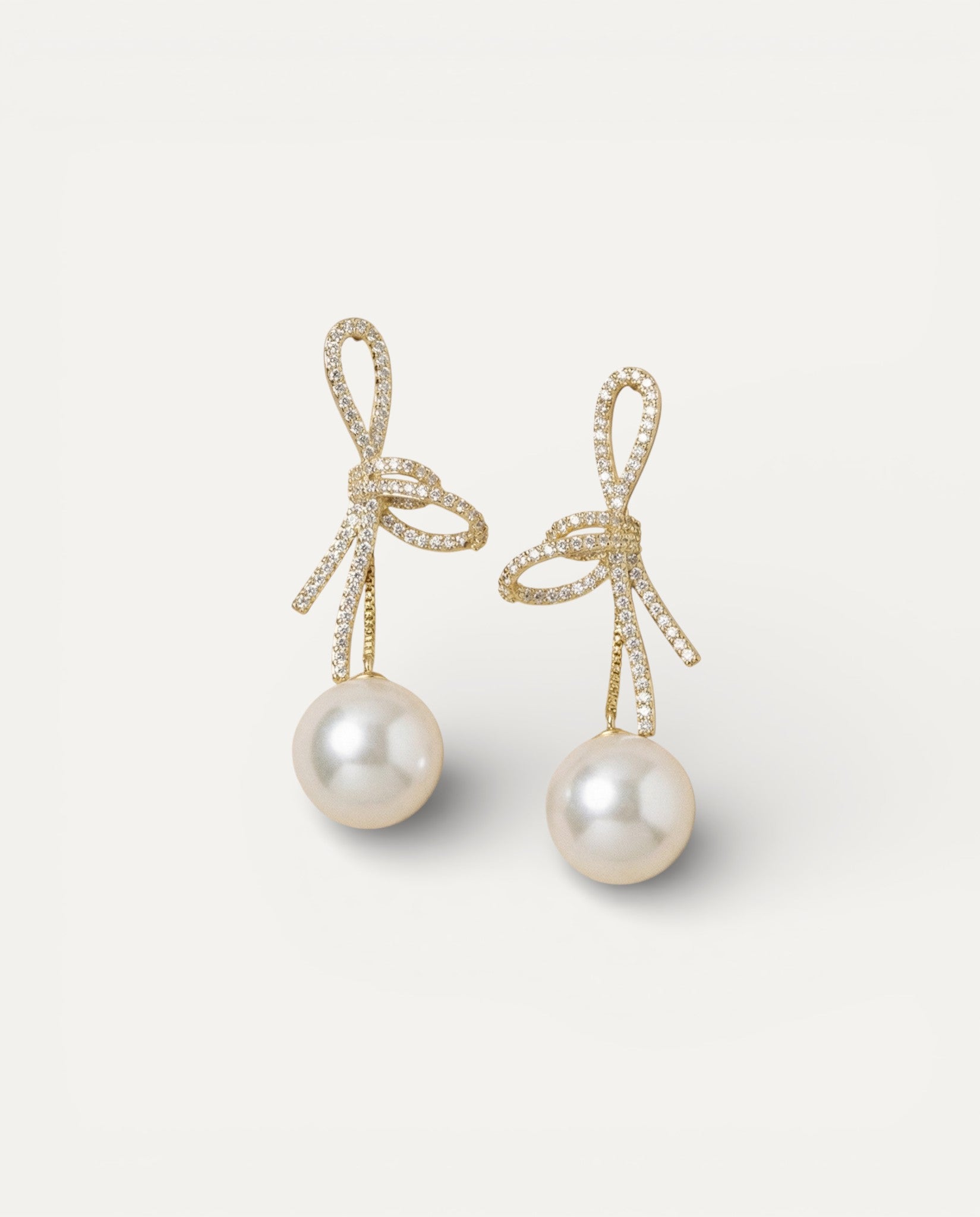 Gold Sparkling Bow Pearl Earrings