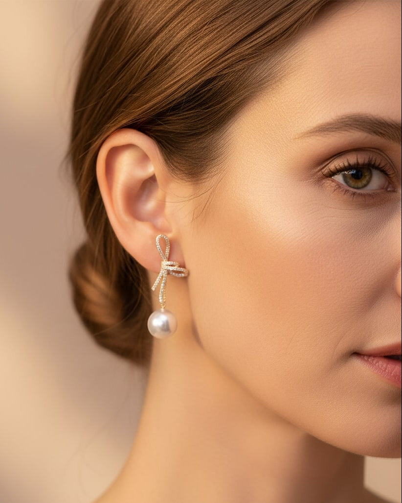 Gold Sparkling Bow Pearl Earrings