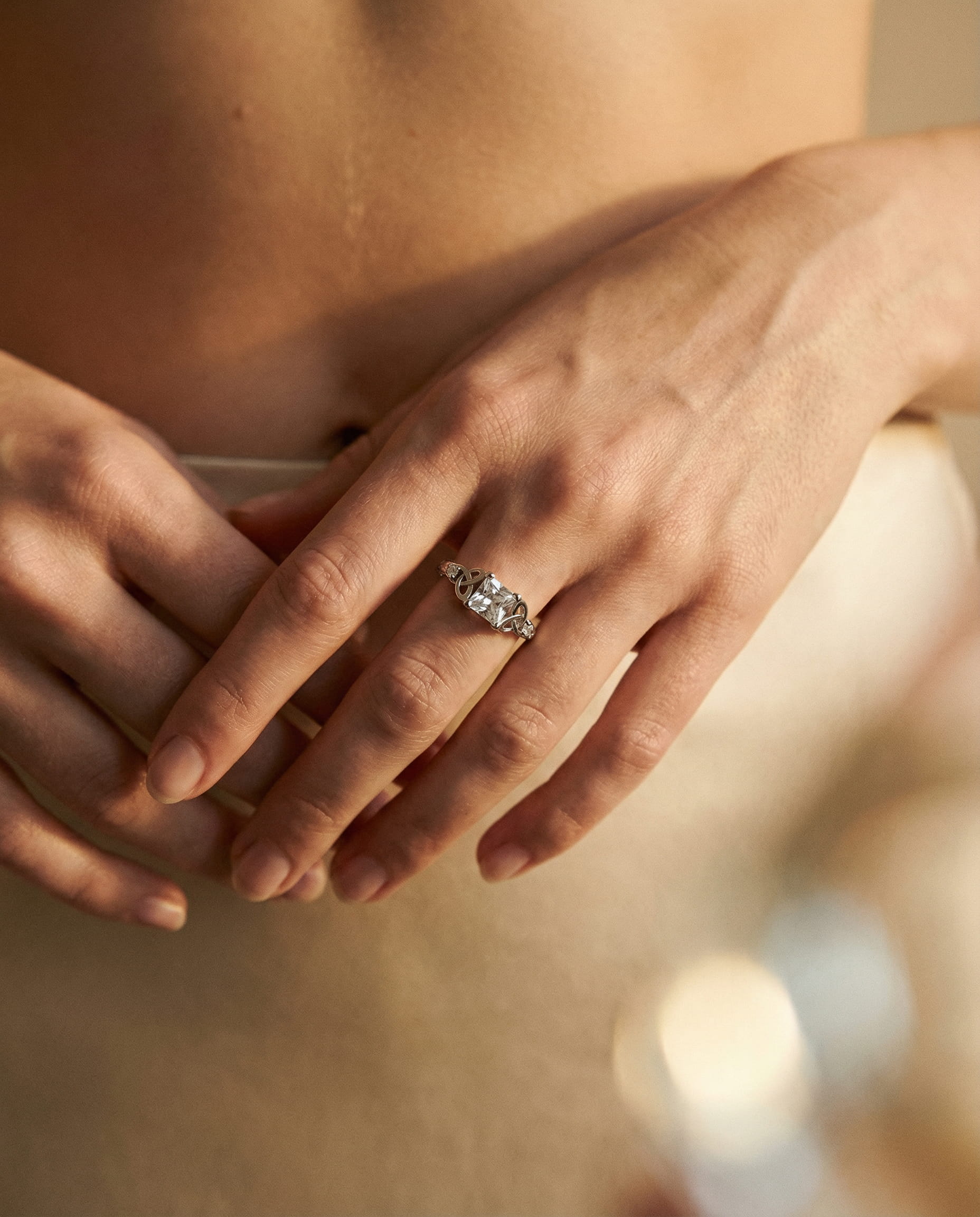 Silver Centre Gemstone Knot Design Ring